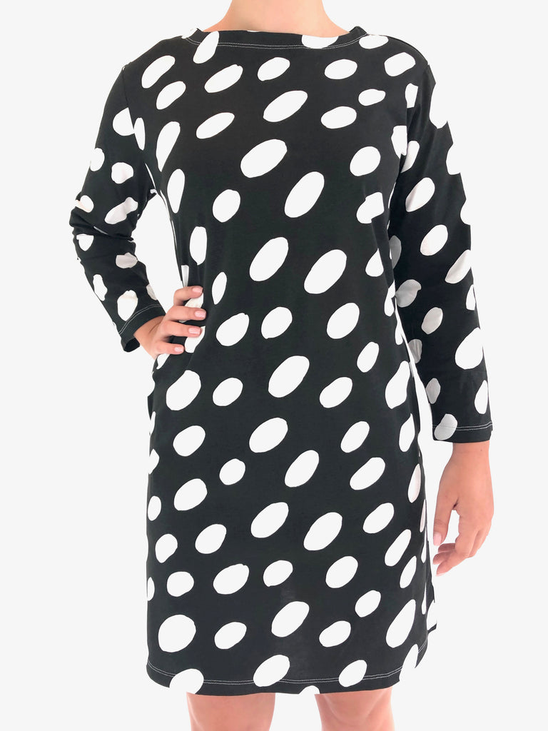 A woman wearing a See Design Knit Dress 3/4 Sleeve.