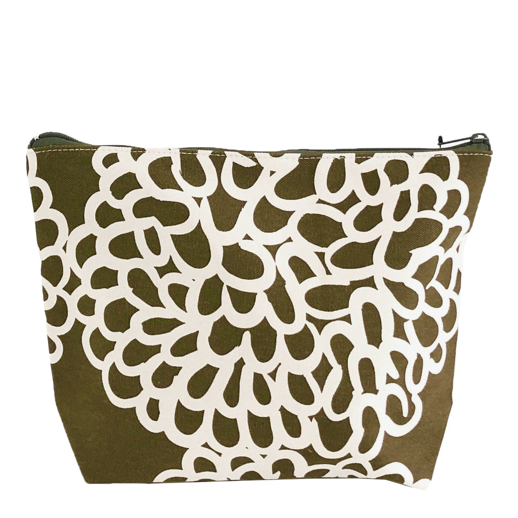 A Travel Pouch Extra Large by See Design, a floral canvas cosmetic bag perfect for travel.