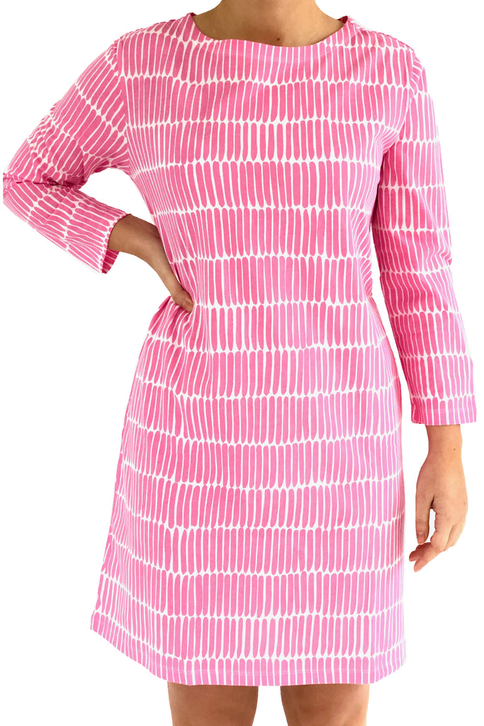 A woman wearing a versatile See Design Knit Dress 3/4 Sleeve.