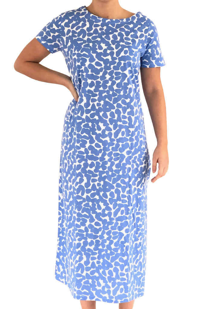A comfortable See Design Knit Dress Full Length with a boat neck collar, featuring a blue and white print.