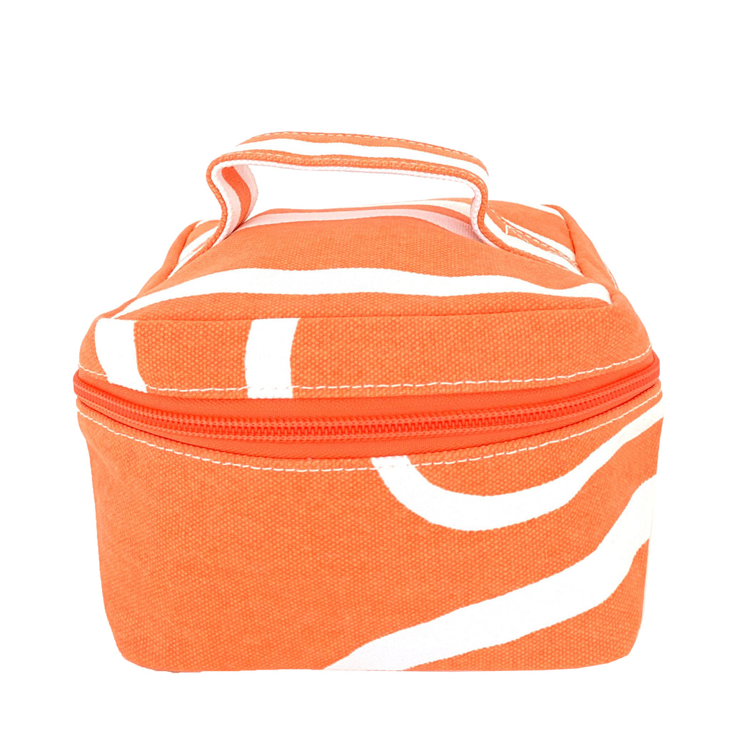 A Train Case Small by See Design, an orange and white lunch bag with a zipper.