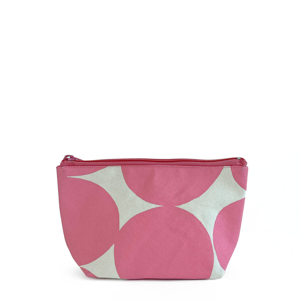 A See Design Travel Pouch Small with polka dots.
