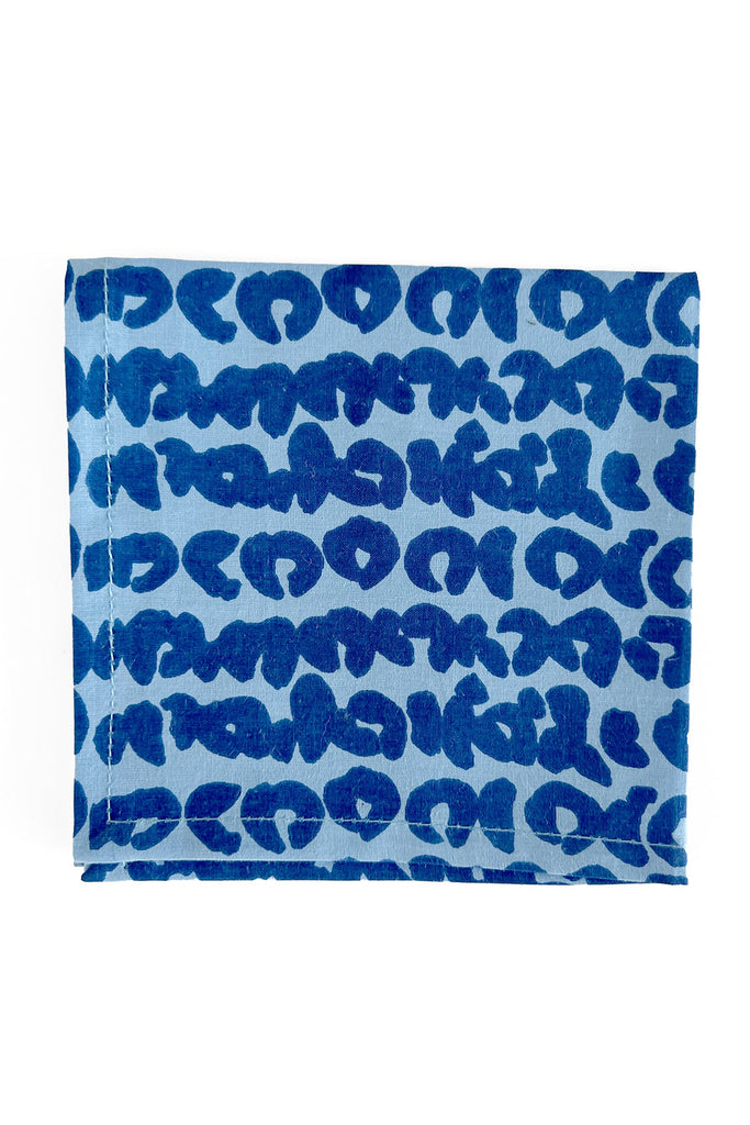 A colorful blue and white cotton cocktail napkins (set of 4) with a leopard print by See Design.