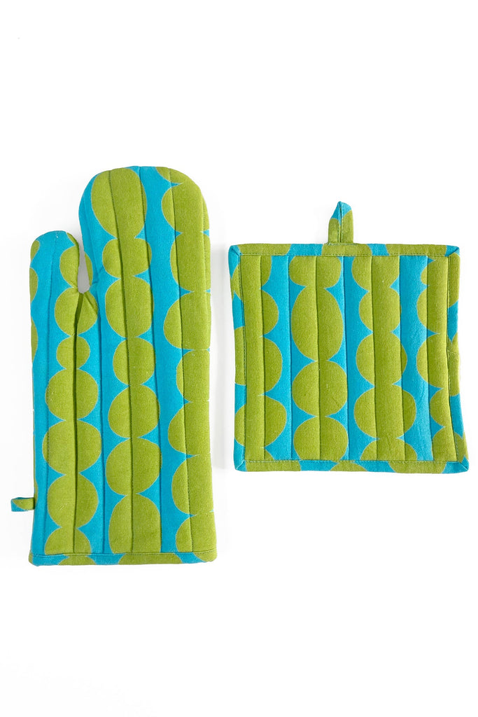 A pair of See Design hand painted Oven Mitt & Potholder Set with blue and green designs on a white surface.