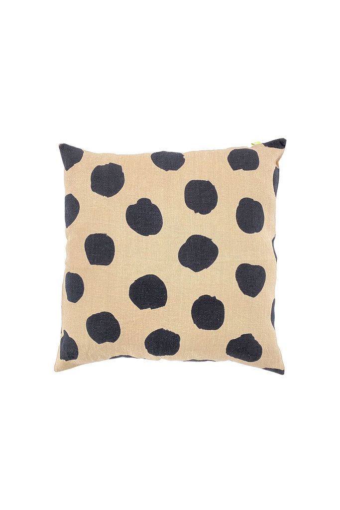 A hand painted linen 20" pillow cover with a beige and black polka dot design on a white background by See Design.
