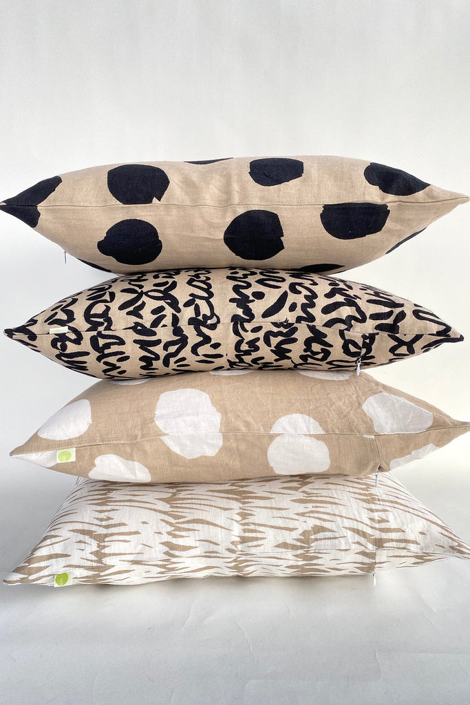 Four See Design Linen 20" Pillow Covers with hand painted black and white polka dot designs.