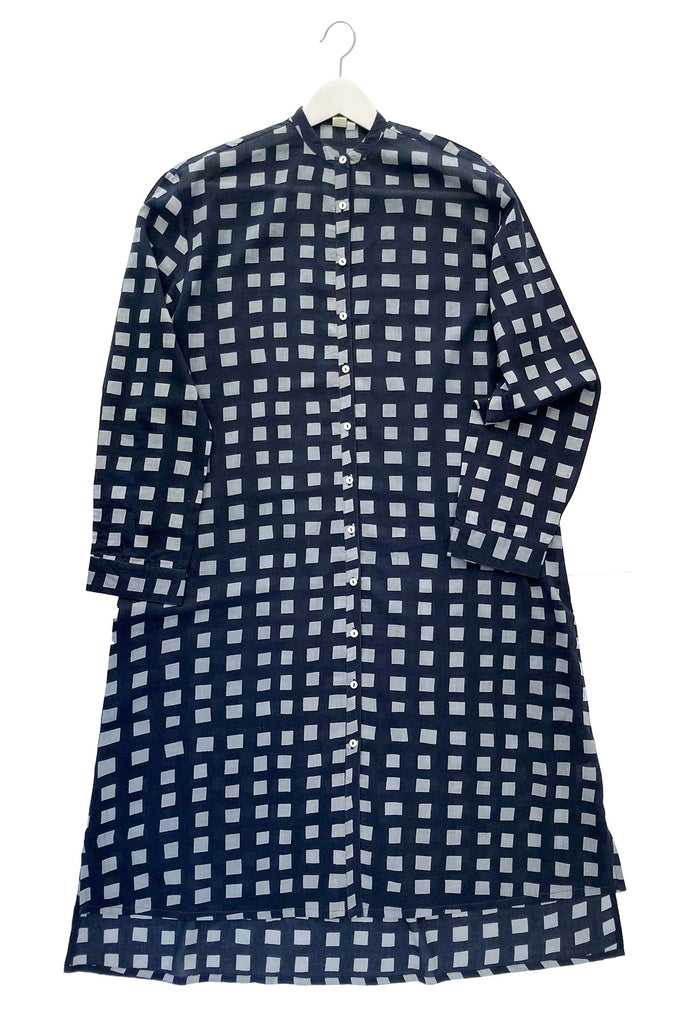 A versatile woman wearing a comfortable See Design shirt dress.