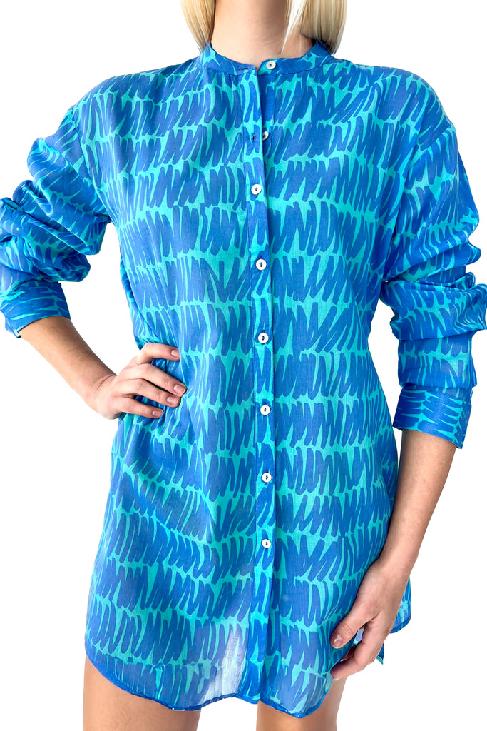 A fashionable woman wearing a comfortable See Design long shirt.