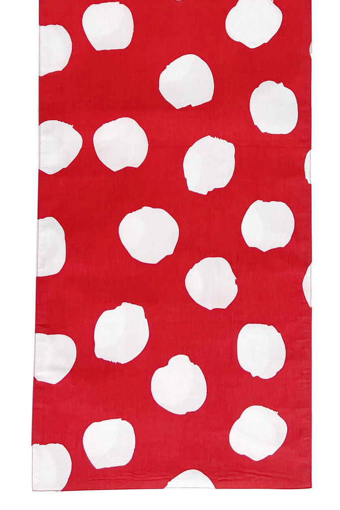 The See Design Table Runner features red cotton fabric with irregular white polka dots, perfect for adding charm and creativity to your table setting.