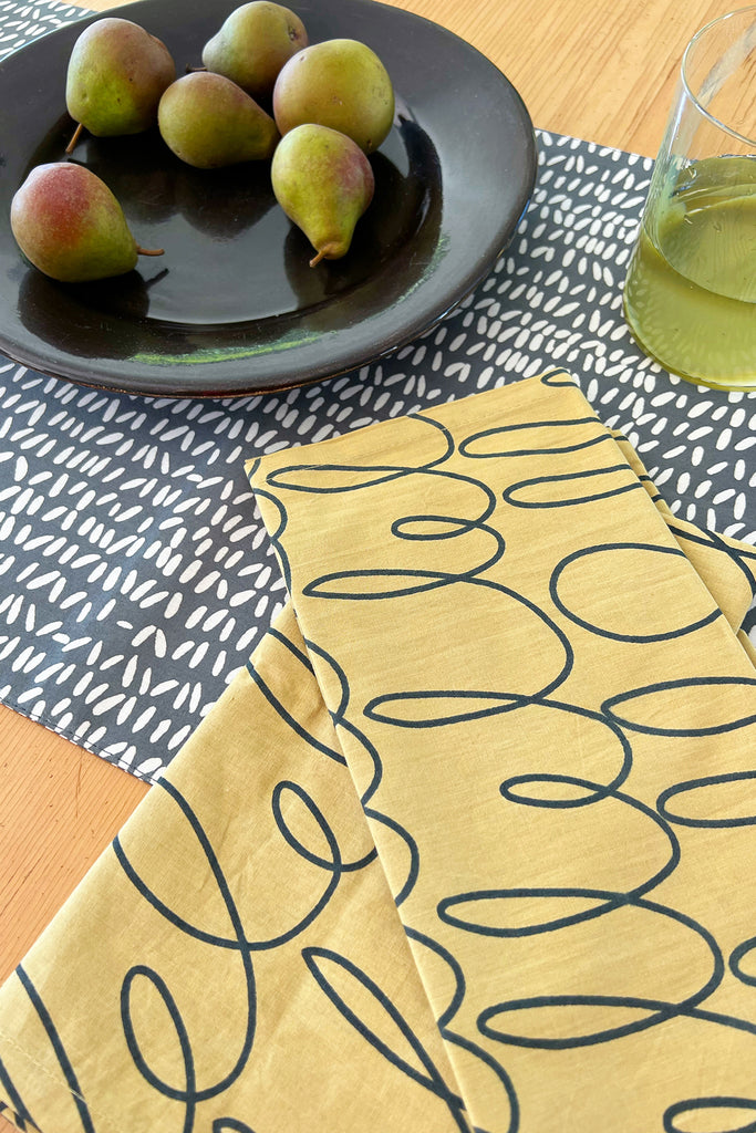 A set of hand painted designs on See Design cotton napkins (Set of 4).