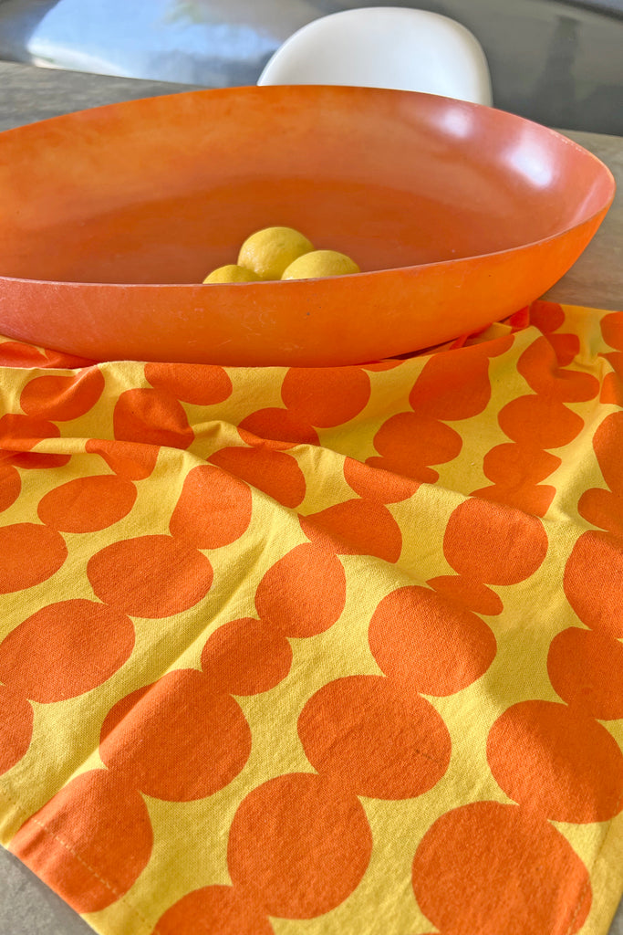 Vibrant orange and yellow polka dot cotton See Design tea towels (set of 2).