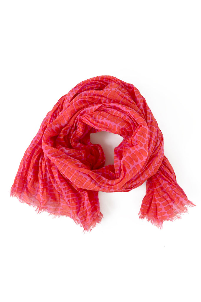 A lightweight cotton scarf by See Design on a white background.