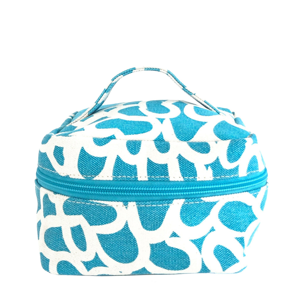 A blue and white Train Case Small cosmetic bag with a zipper for travel purposes, made by See Design.