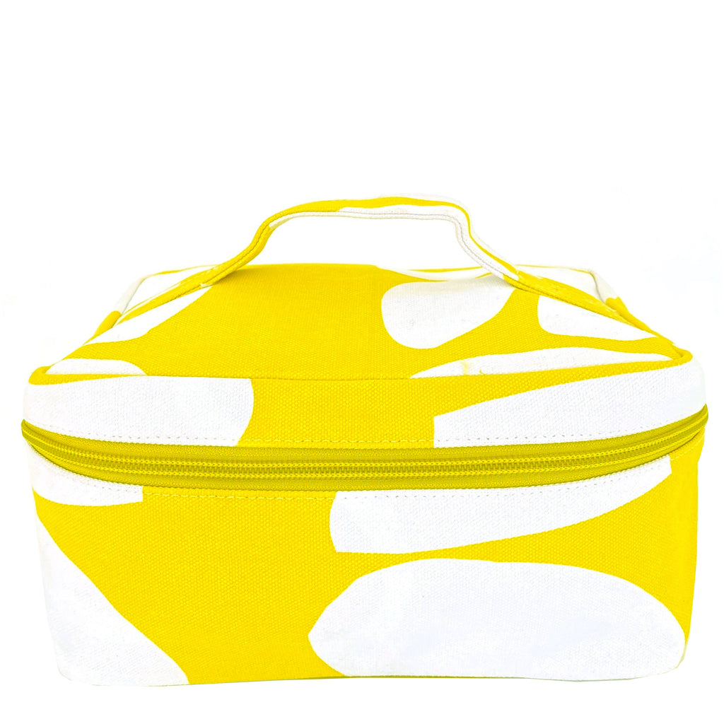 A yellow and white Train Case Large makeup bag on a white background made by See Design.