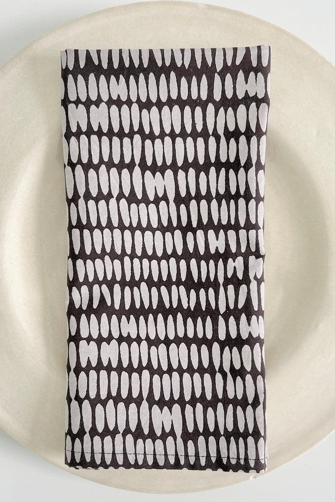 A See Design hand painted design on a set of 4 cotton napkins.