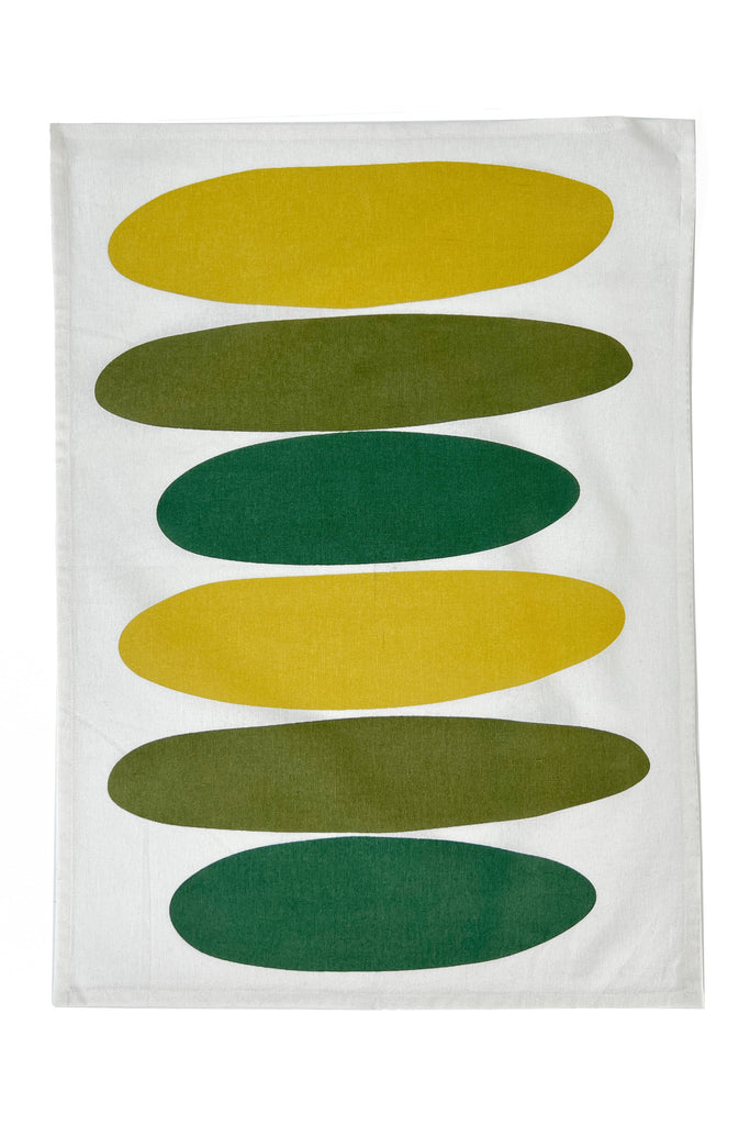 A See Design tea towel with green and yellow stripes, ideal for kitchen cleaning.