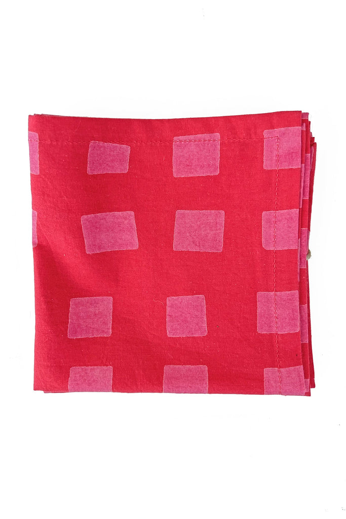 A See Design Cocktail Napkin (Set of 4) with hand painted squares on it.