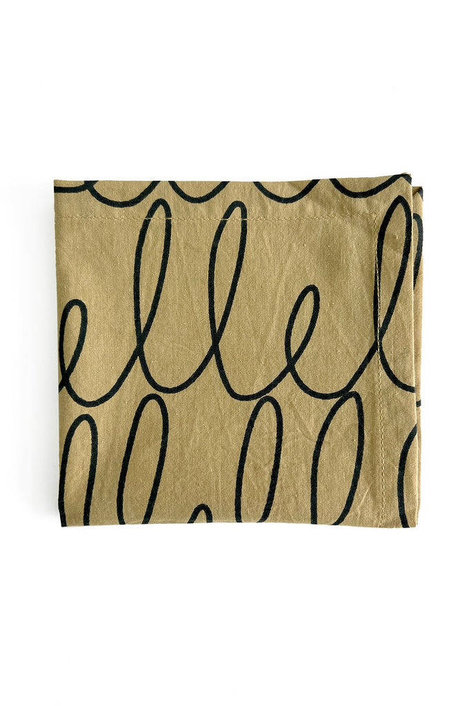 A set of 4 See Design Cocktail Napkins with the word hello hand painted on them.