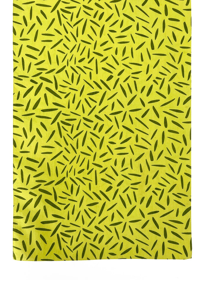A yellow Table Runner with a black pattern by See Design.