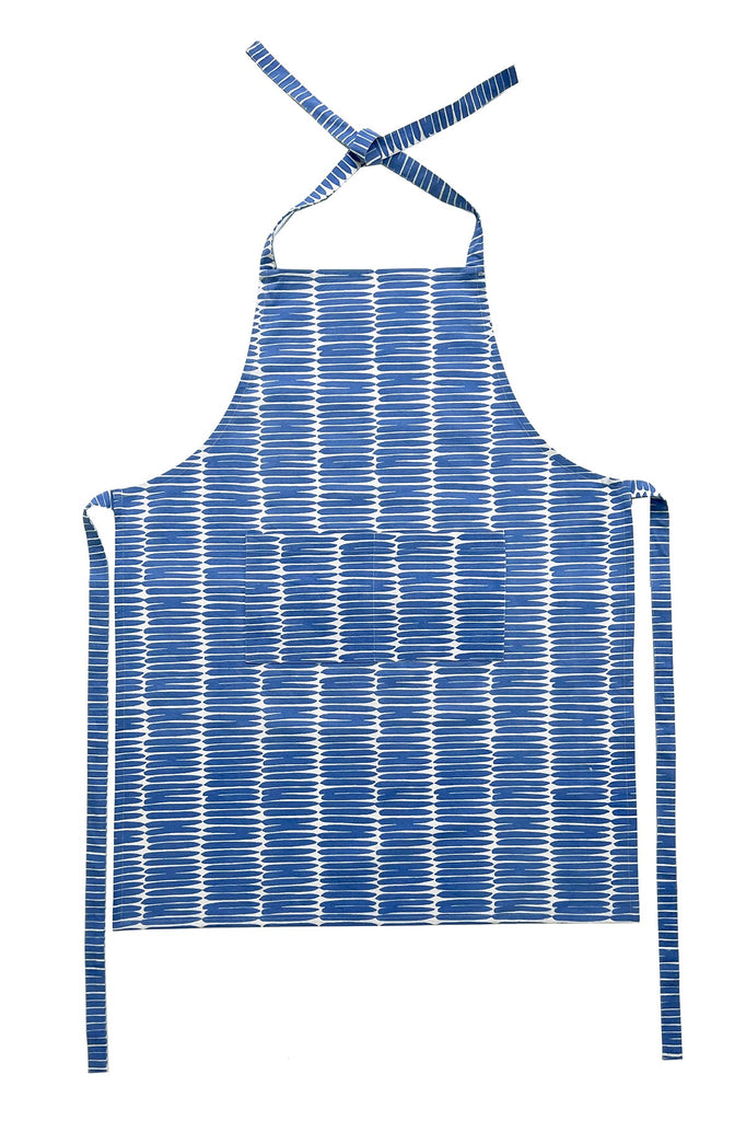 An eye-catching blue and white striped hand-painted See Design kitchen apron perfect for cooking.