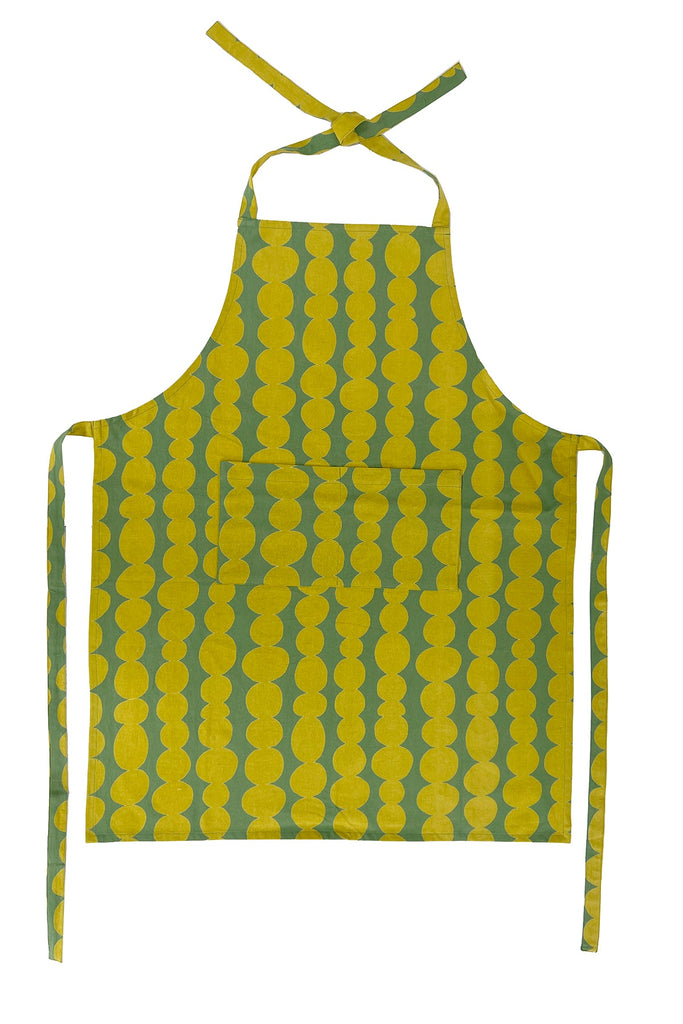 A See Design apron with polka dot designs.