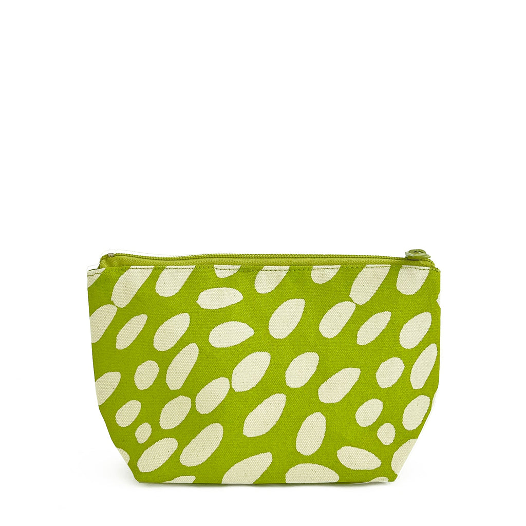 A compact green and white polka dot See Design Travel Pouch Small.