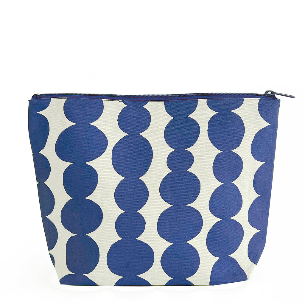 A See Design cosmetic bag with polka dots.