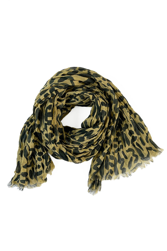 A See Design cotton leopard print scarf with a crinkled texture on a white background, offering a luxurious touch.