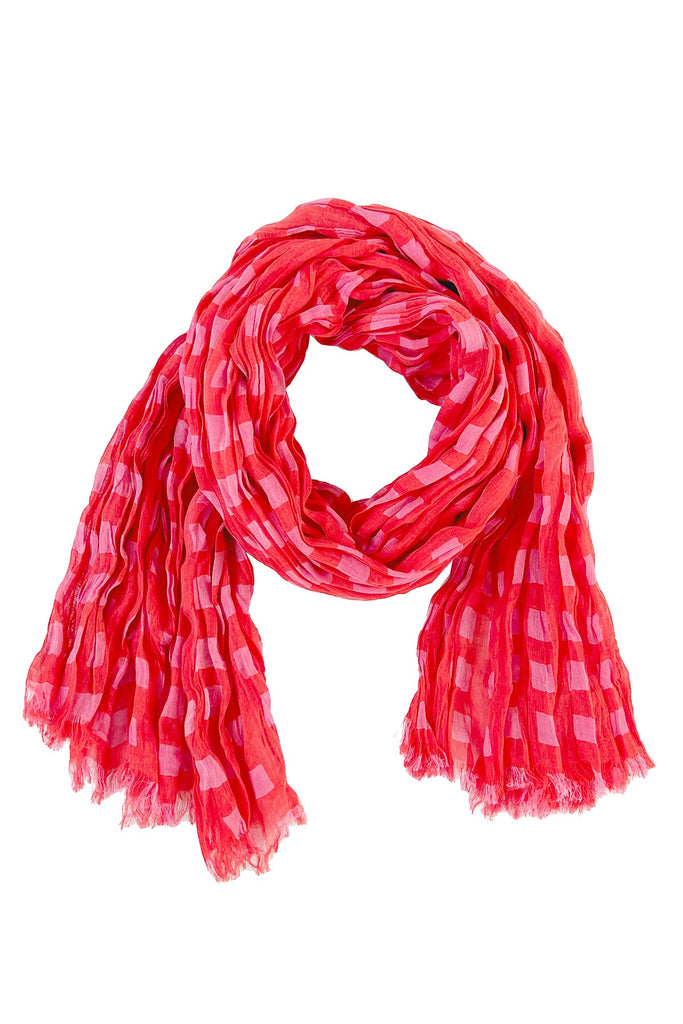 A lightweight red and white See Design cotton scarf on a white background.