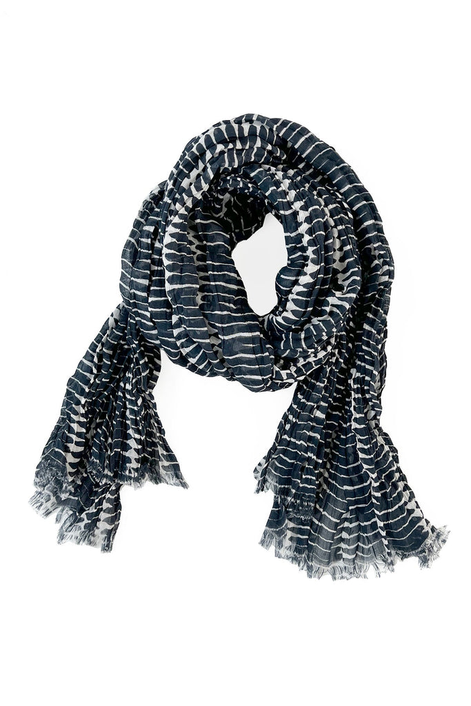 A black and white See Design cotton scarf on a white background.