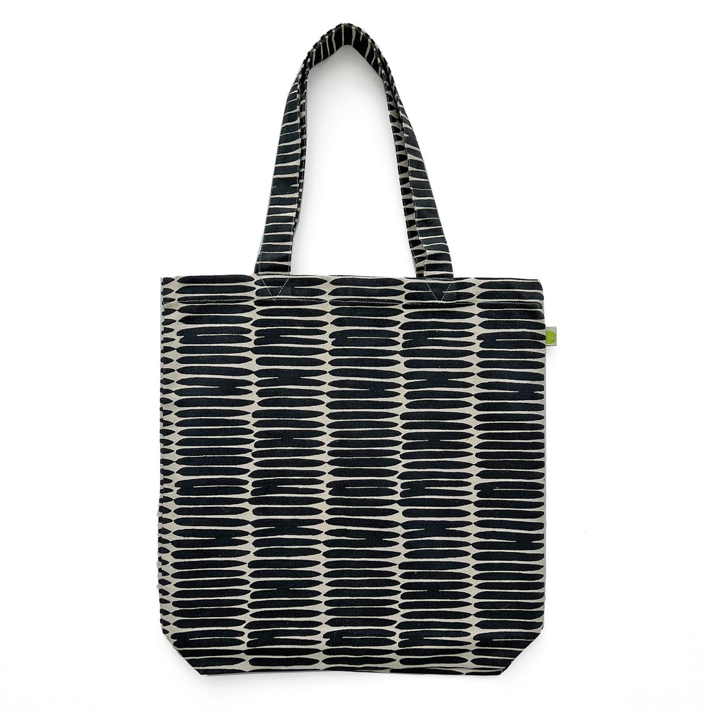 A lightweight cotton canvas Easy Tote Bag with a black and white striped pattern by See Design.