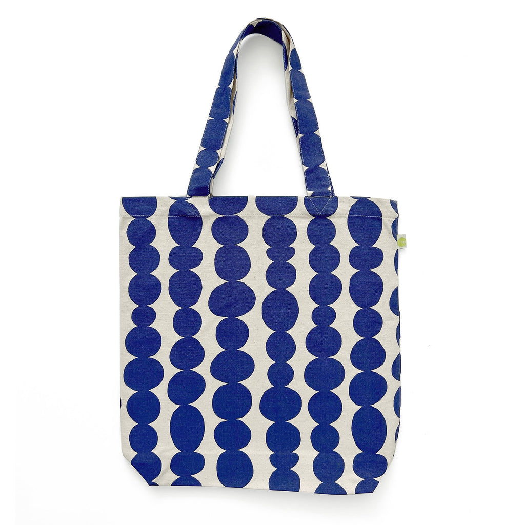 A lightweight blue and white polka dot cotton canvas Easy Tote Bag by See Design.