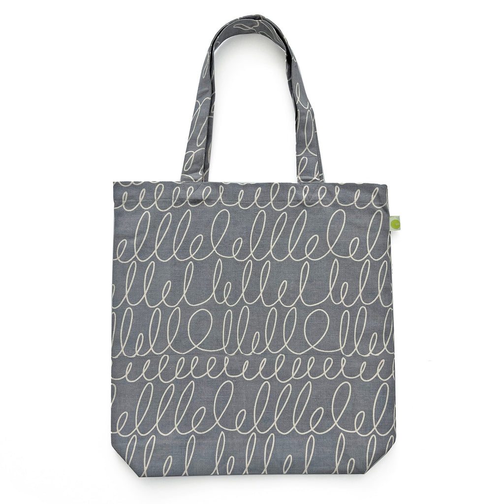 A lightweight Easy Tote Bag by See Design, made of cotton canvas with a hand-painted artwork design.