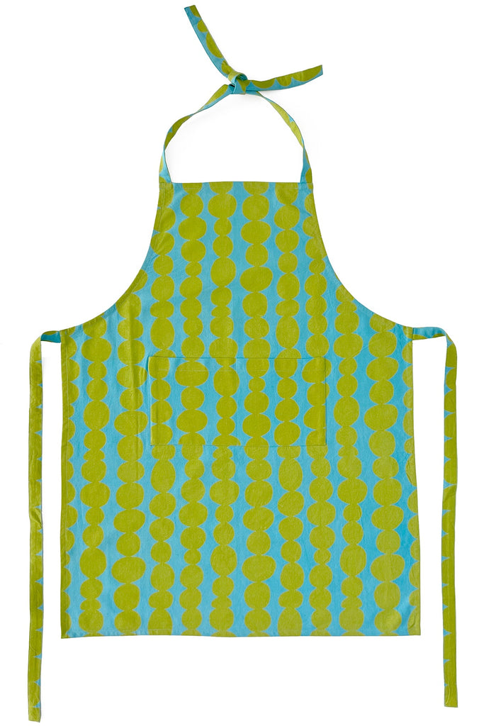 A See Design apron with hand-painted polka dot designs in green and blue.