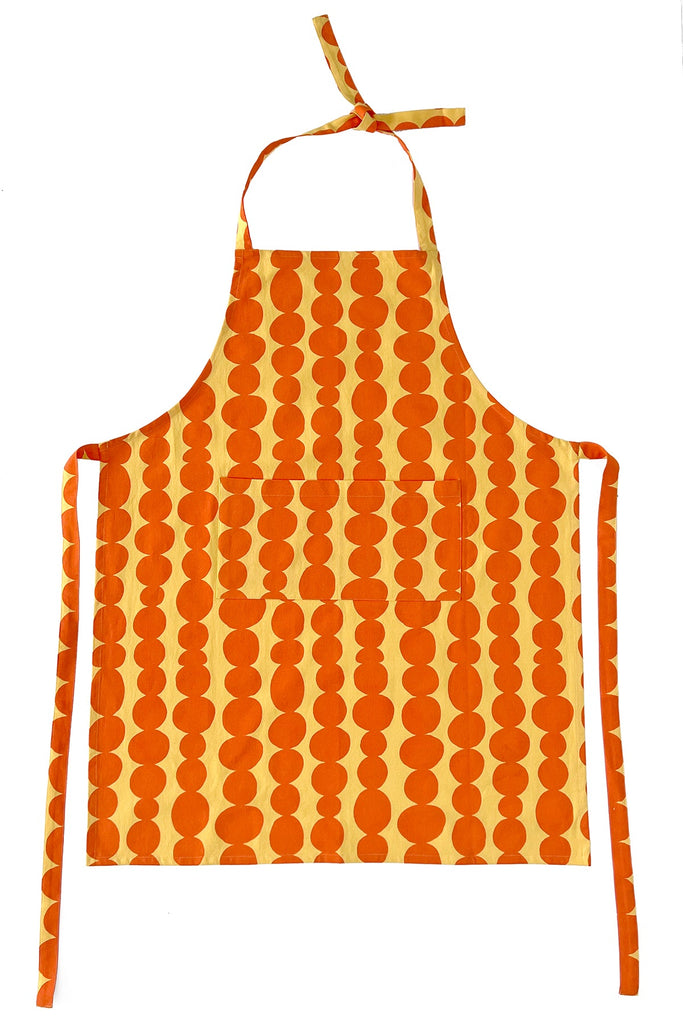 A See Design kitchen apron with hand-painted polka dot designs, perfect for cooking.