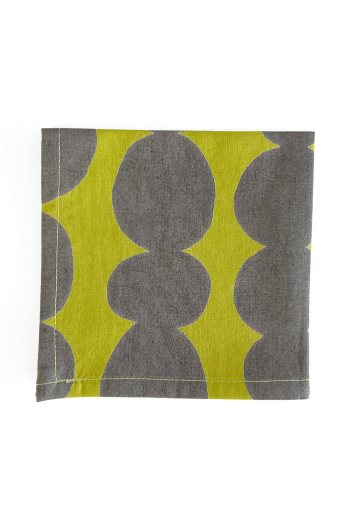 A grey and yellow cotton cocktail napkin (Set of 4) with a polka dot pattern by See Design.