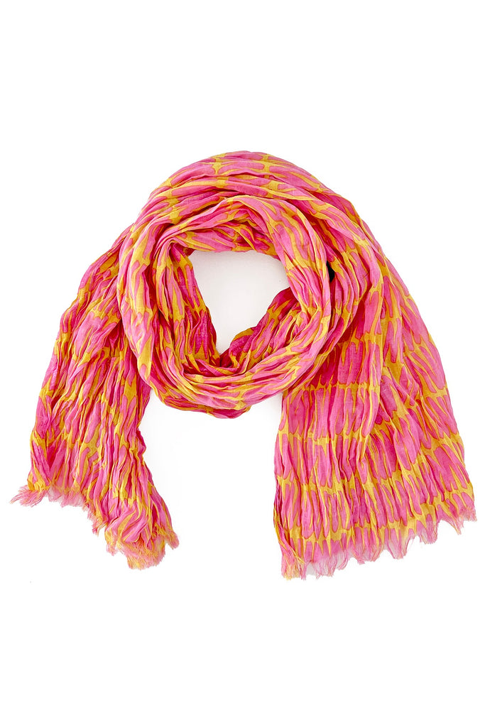 A lightweight and crinkled See Design cotton scarf in pink and yellow on a white background.