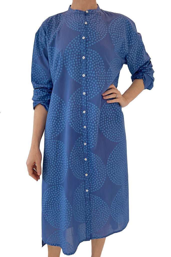 A woman wearing a comfortable See Design shirt dress.