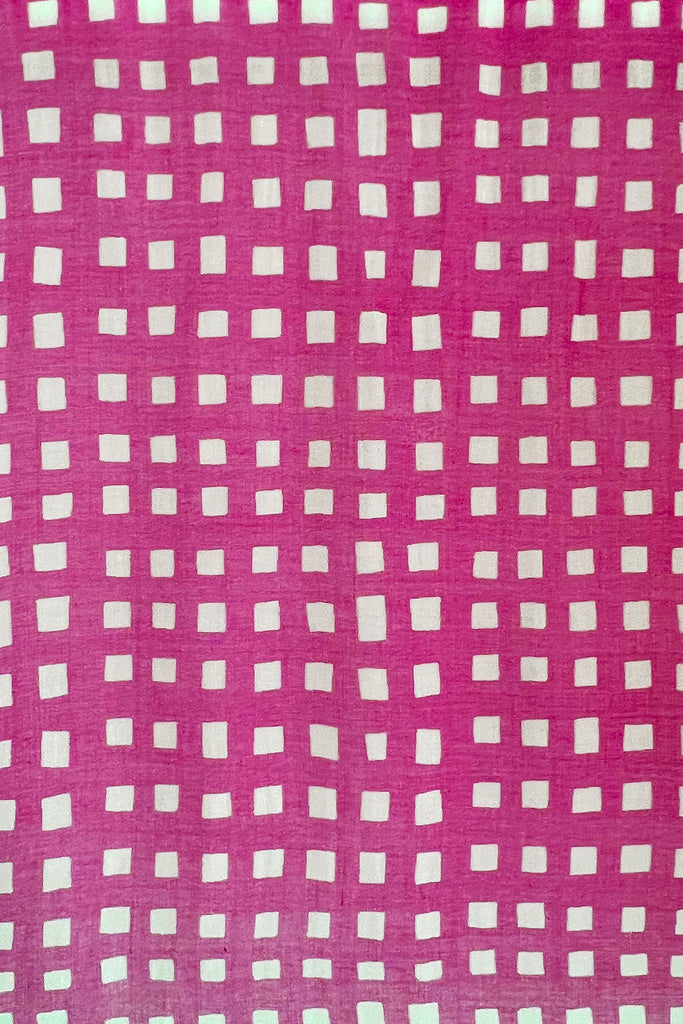 A See Design wool scarf with bright pink fabric and white squares, perfect for summer shawls.
