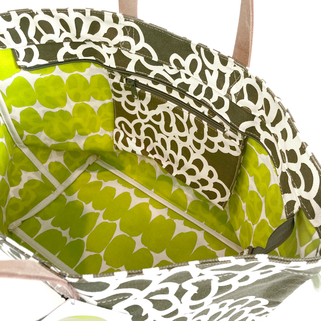 A patterned See Design Overnighter tote bag.