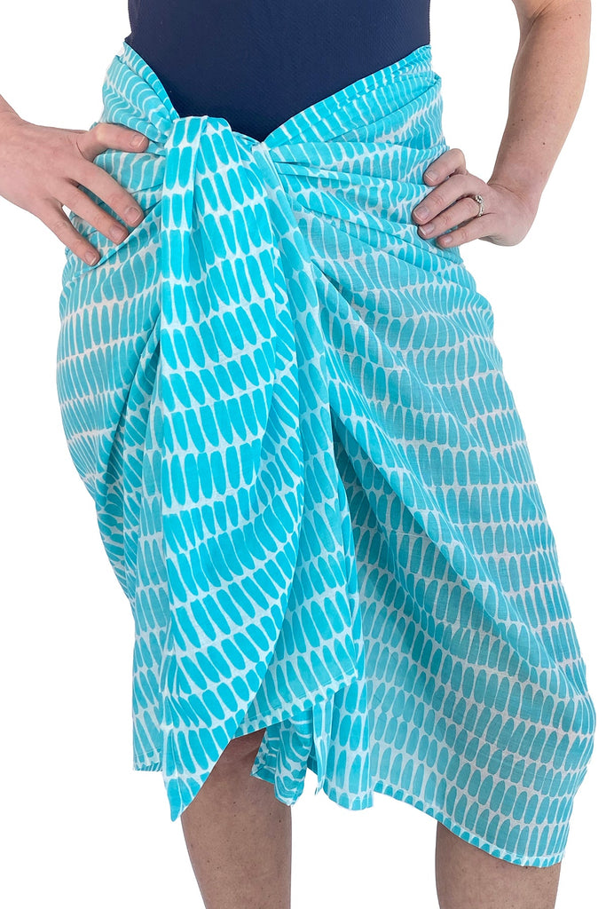 A fashionable woman in a lightweight cotton See Design sarong.