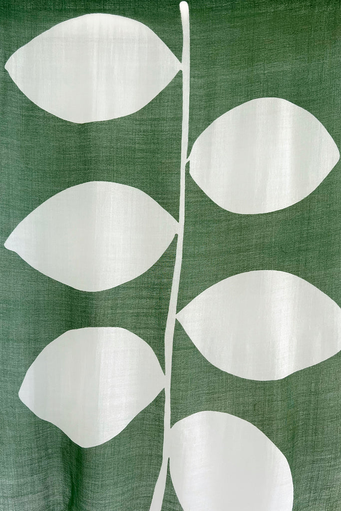 A summer wool scarf made by See Design in bright colors.