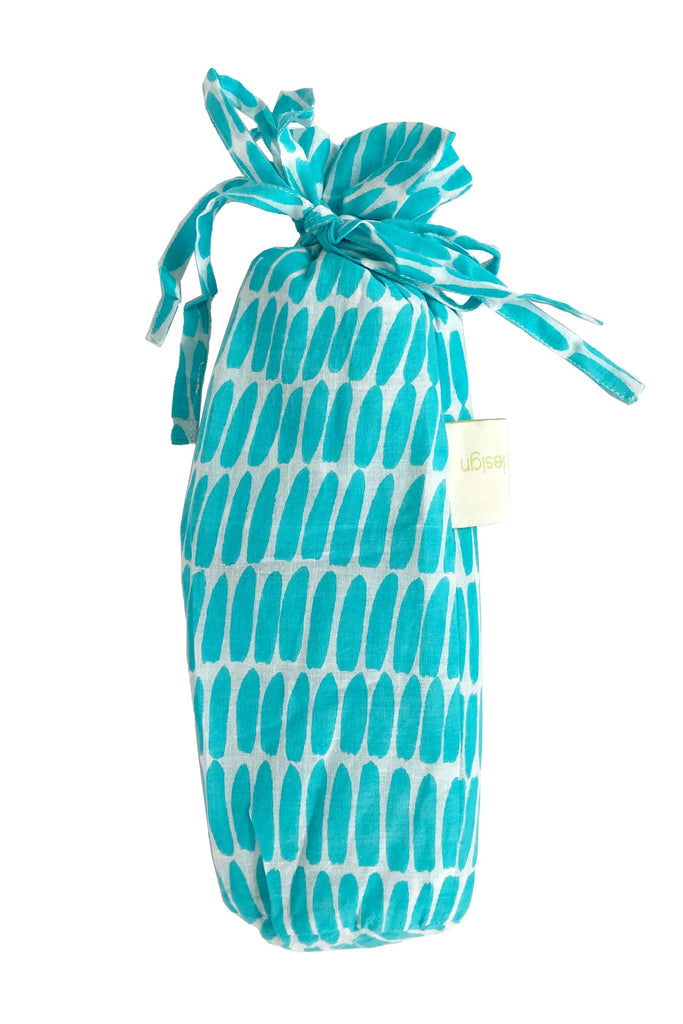 A fashionable Sarong bag with a bow tied around it by See Design.