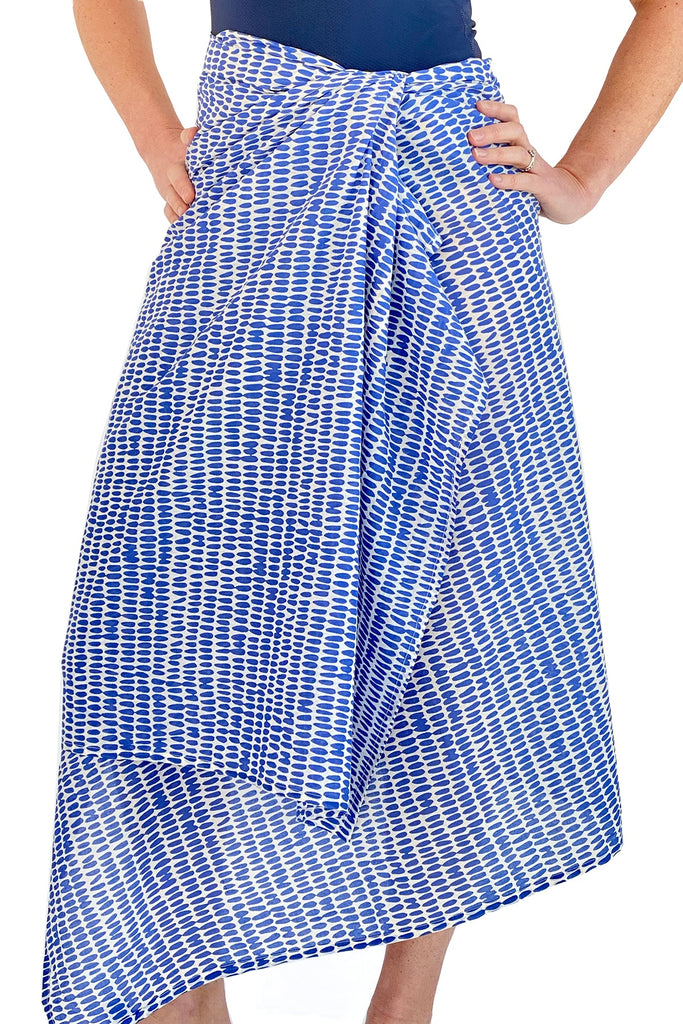 A fashionable woman wearing a lightweight cotton See Design sarong.
