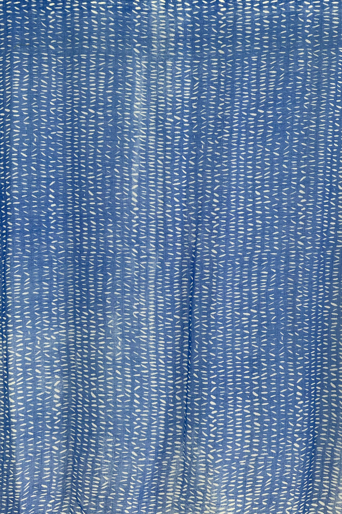 A See Design Wool Scarf with bright colors and white lines on it.