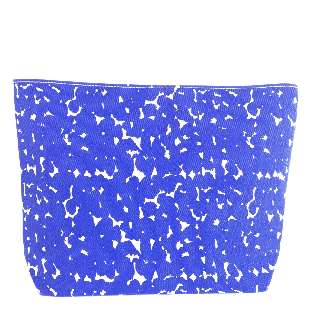 A blue and white spotted See Design Travel Pouch Extra Large.